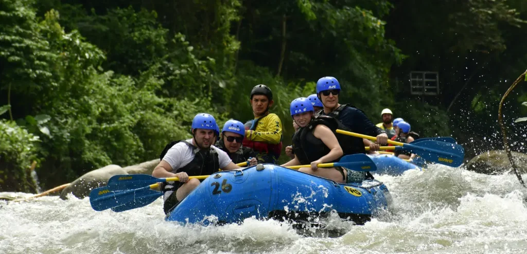 group rafting together through a river section with wave expeditions in costa rica